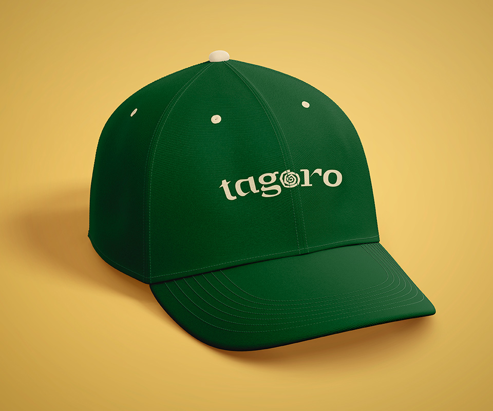 dark green cap, yellow 'tagoro' on the front.
